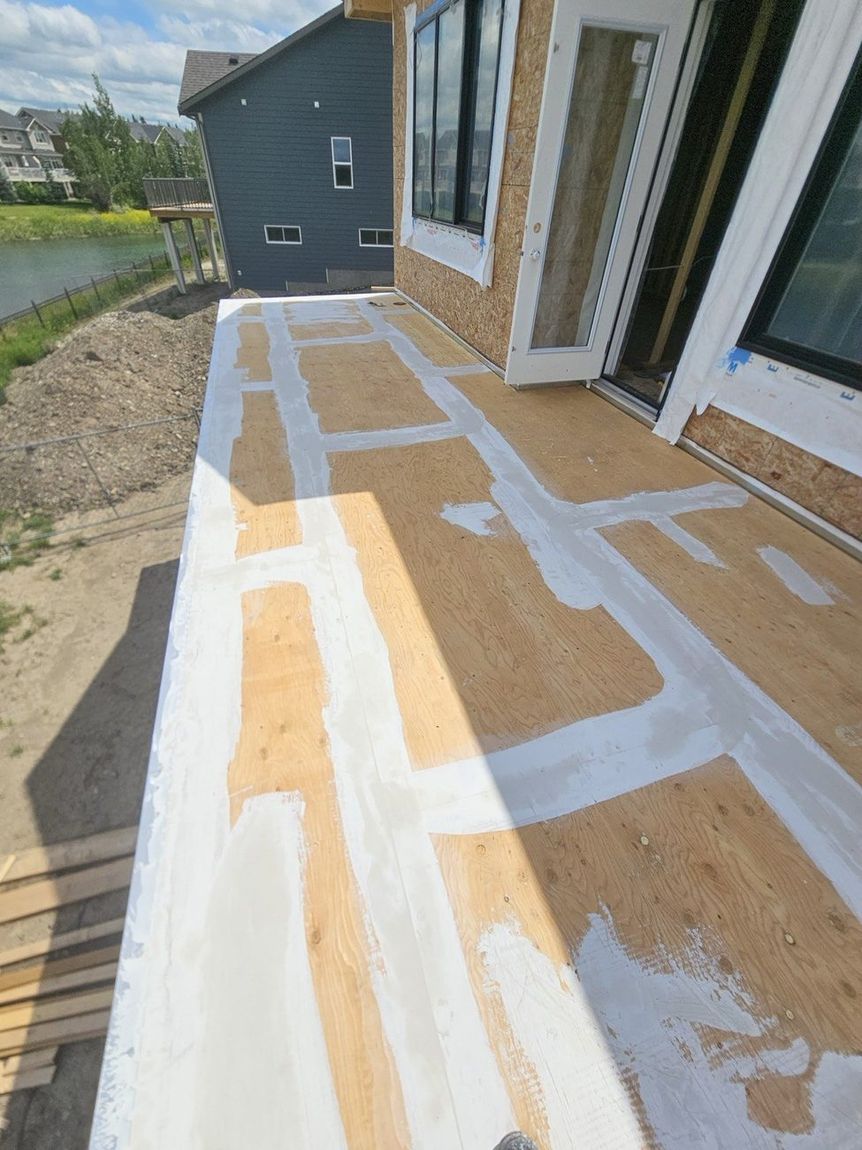 Finished granite-texture vinyl membrane deck — DJD Renovations
