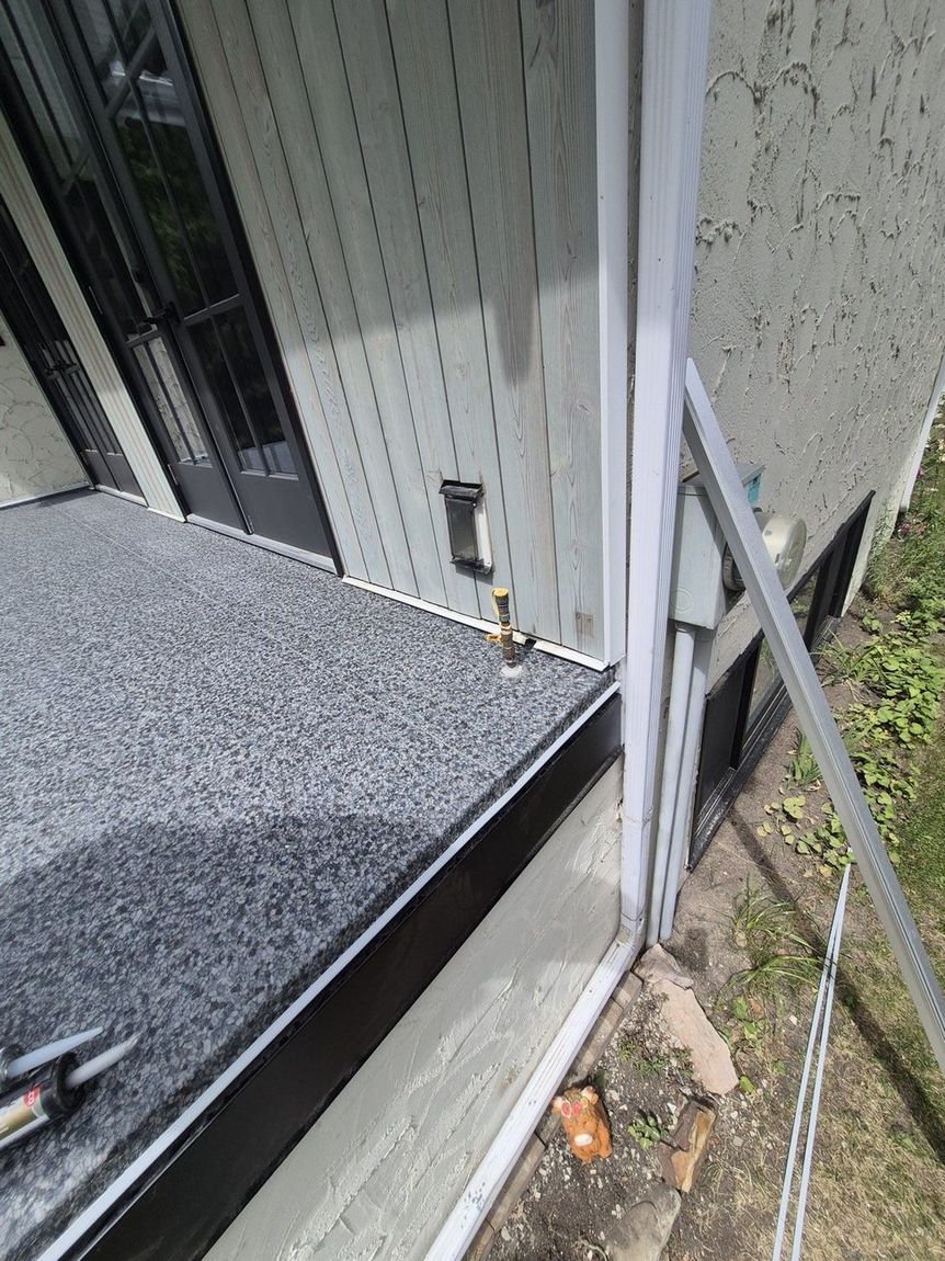 Finished granite-texture vinyl membrane deck — DJD Renovations