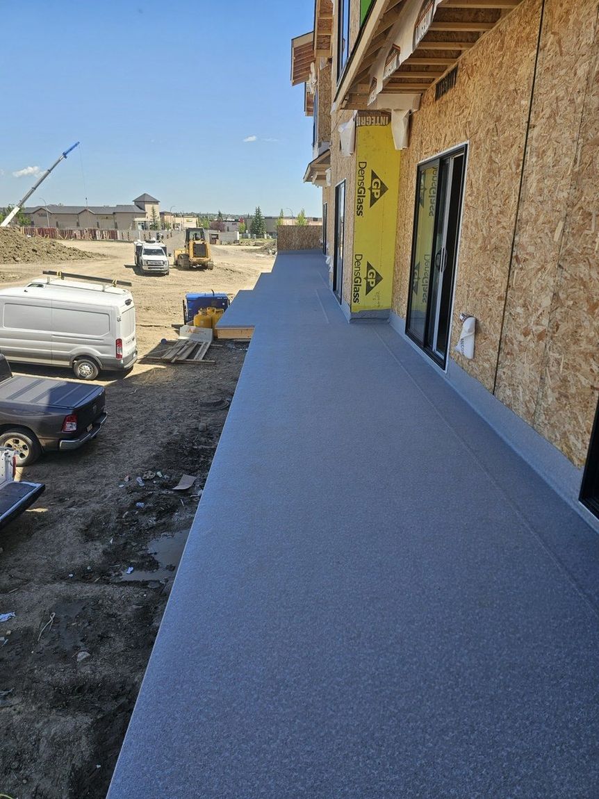 Finished granite-texture vinyl membrane deck — DJD Renovations